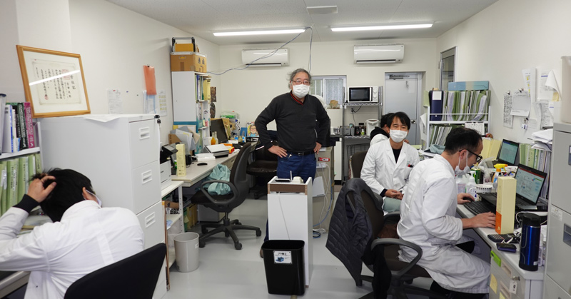 Photo of the SARAYA laboratory office taken in 2021. In the middle, Dr. Furata, still acting as an advisor after 50 years.